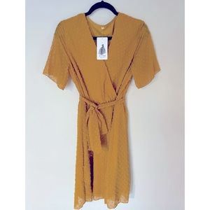 Mustard casual wrap with Swiss dots.